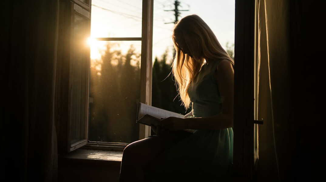 woman reading book